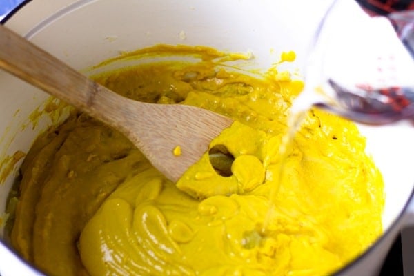yellow mustard in a pot with vinegar