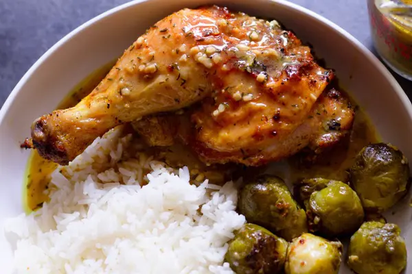 Lemon pepper roast chicken plated 