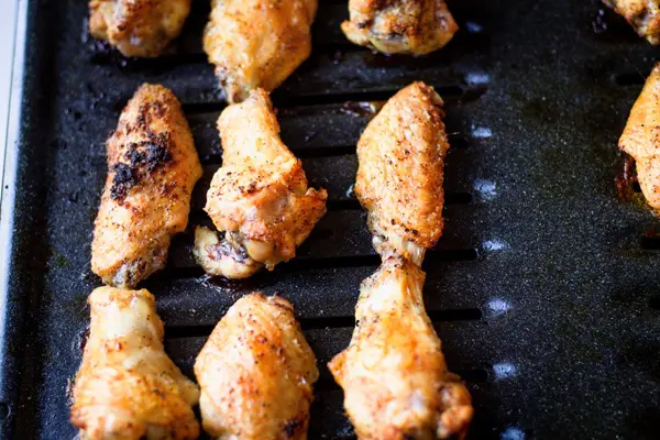 cooked wings on a rack