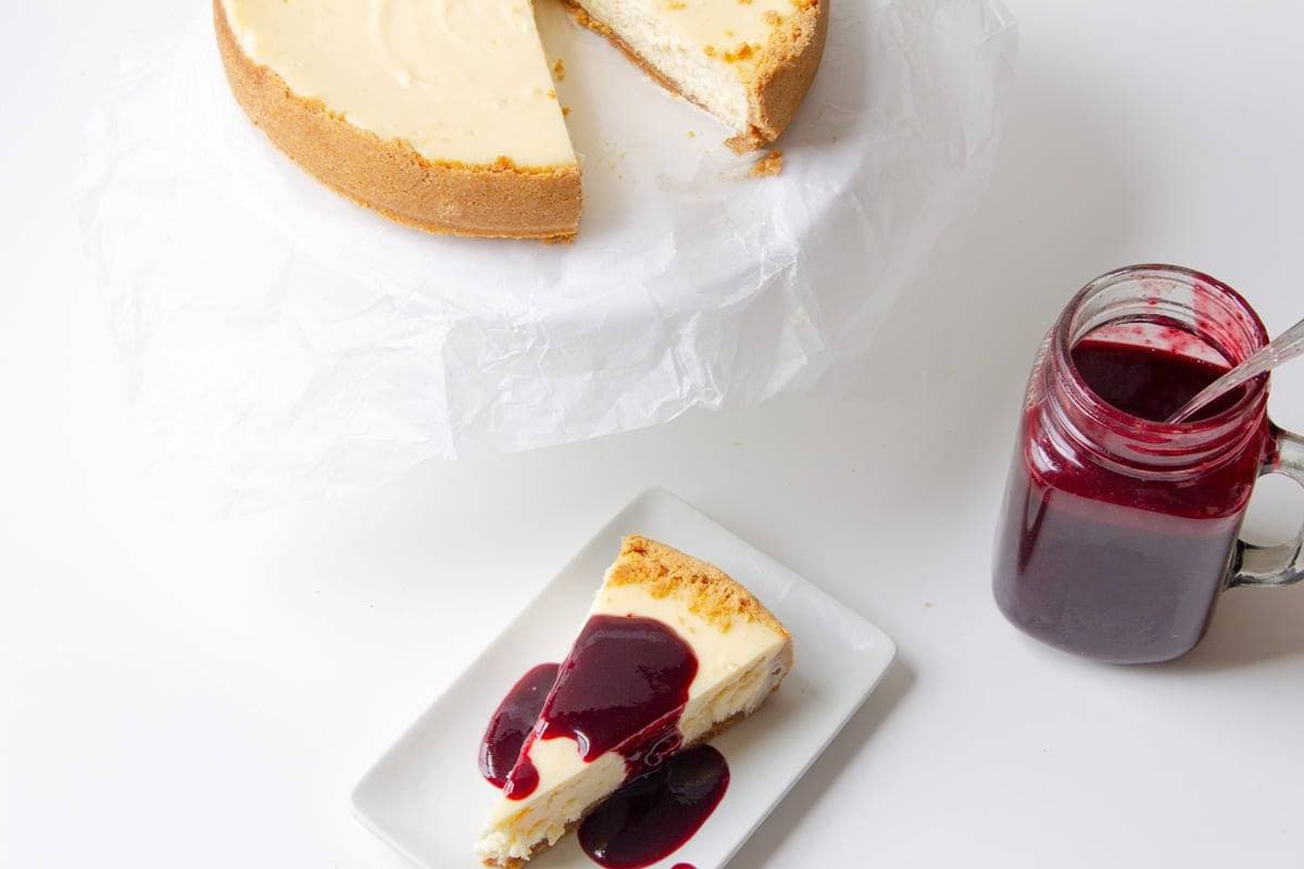 cherry coulis over cheesecake