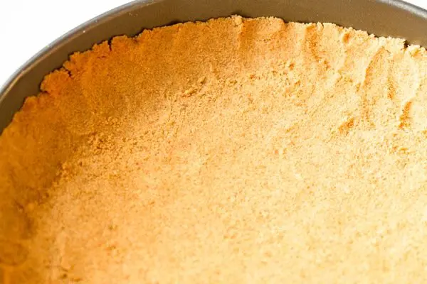 graham cracker crust in a springform pan