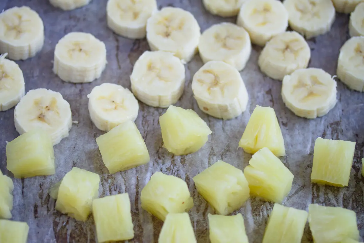 sliced banana and pineapples