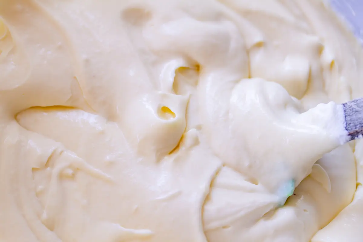 folding whipped cream into pudding