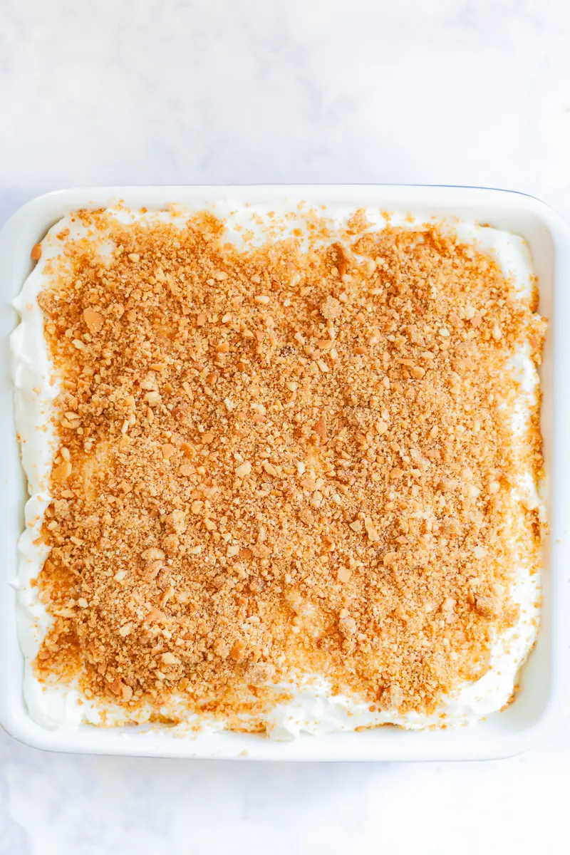 cookie crumb topping on homemade banana pudding