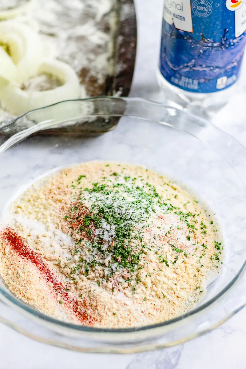 bread crumbs with seasonin g in a dish