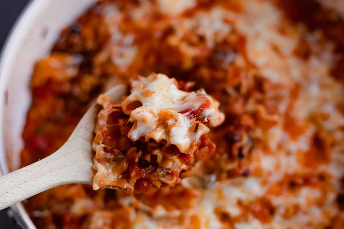 a spoonful of cheesy lasagna