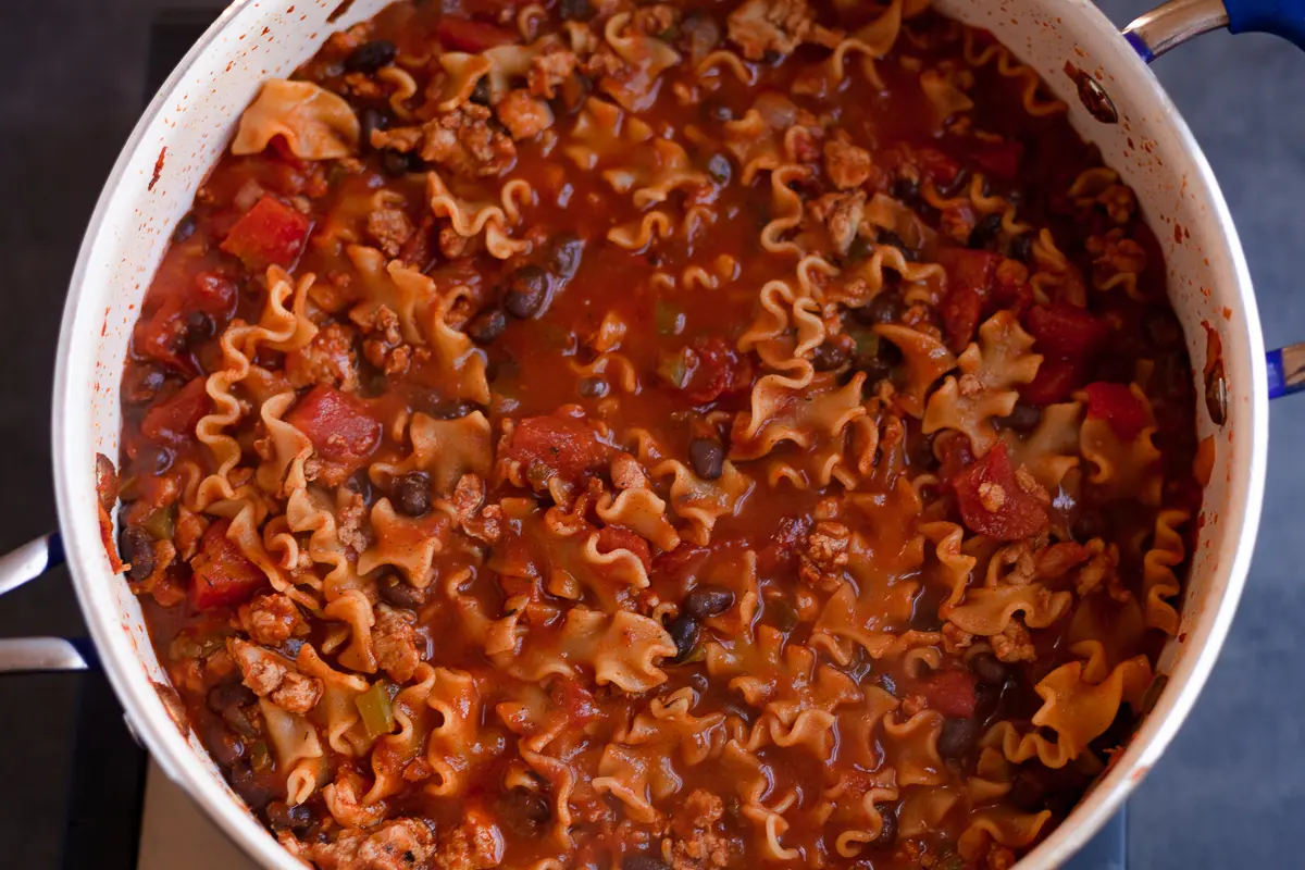 a pot of saucy chicken lasagna