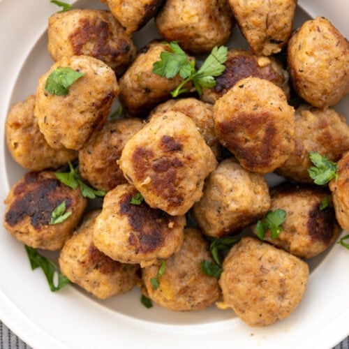 cooked italian turkey meatballs in a bowl